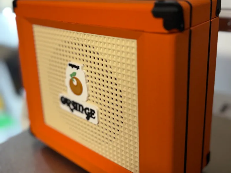 ORANGE AMP COIN BANK