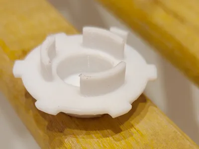 Plastic plug for shower filter.