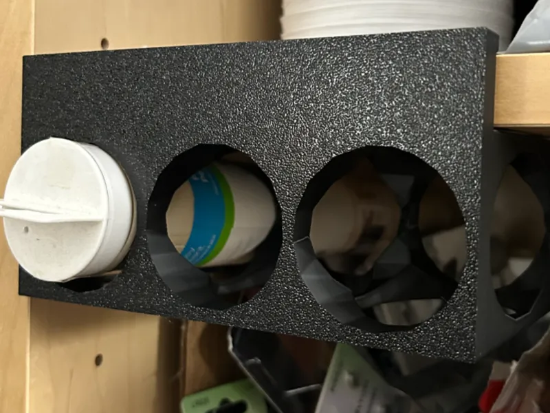 Under shelf vinyl roll holder