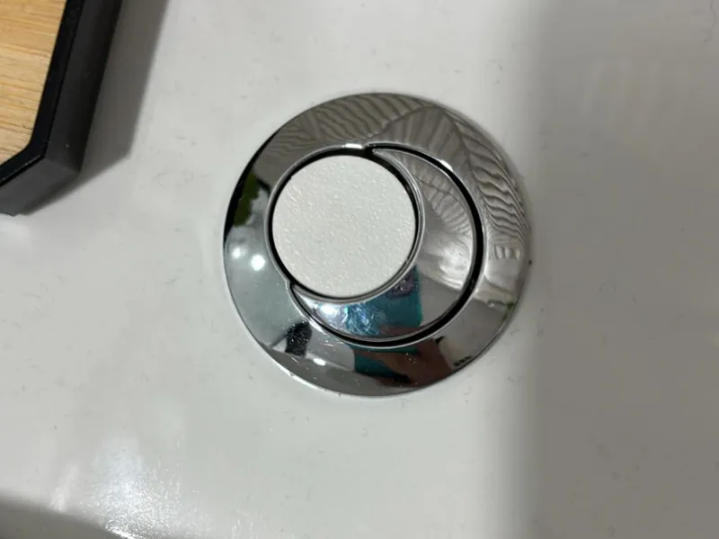 Botón cisterna WC