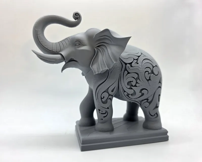 Ornately Carved Elephant on Pedestal
