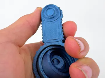 Objeto manipulable: Gyro + Wheel Clicker (Fidget) — vista de referencia 5