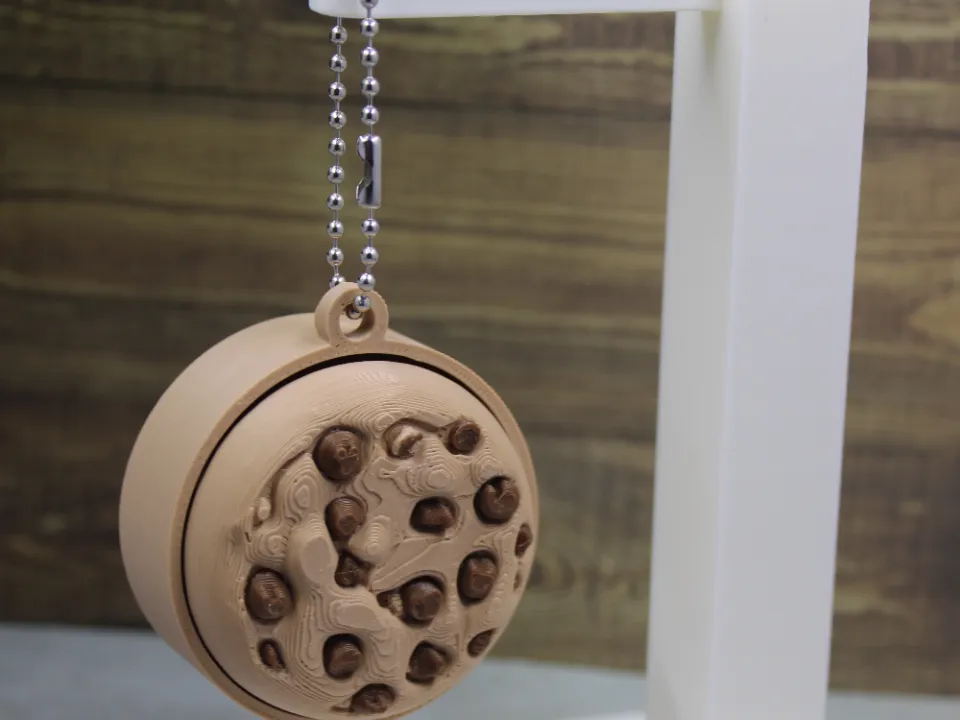 Llavero: Clicker Keychain - Chocolate Chip Cookie. Referencia del modelo original.