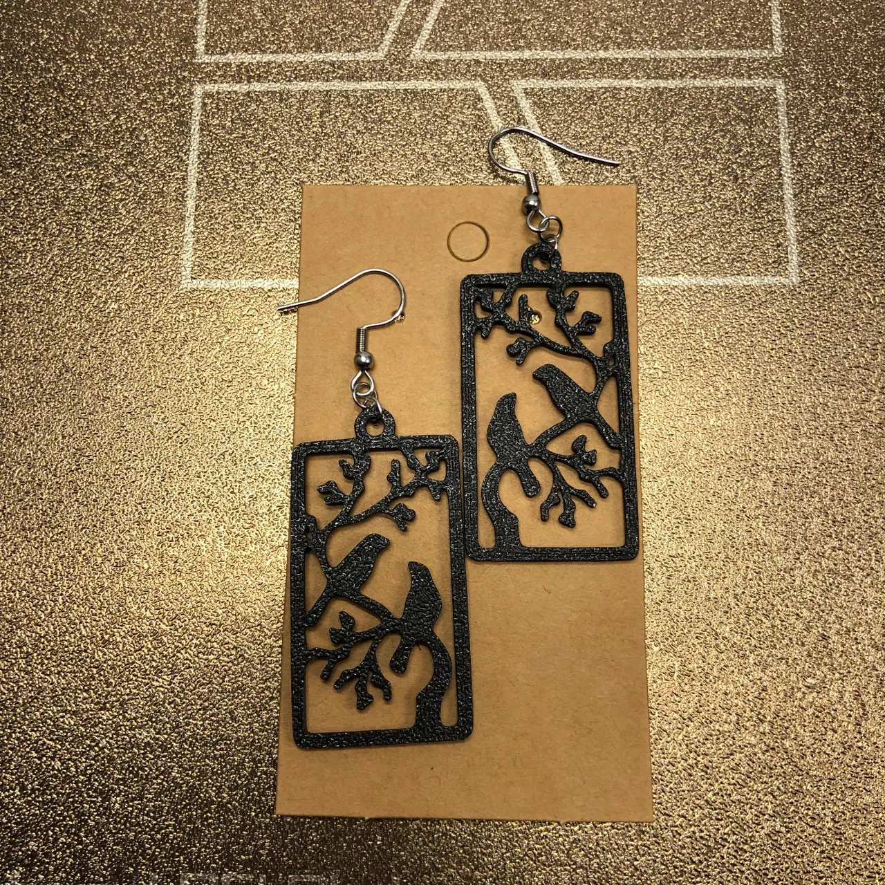 Birds on a branch earrings view 2