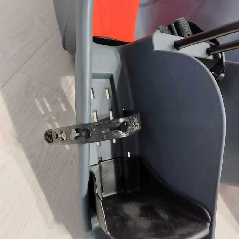 Bicycle child seat - leg strap