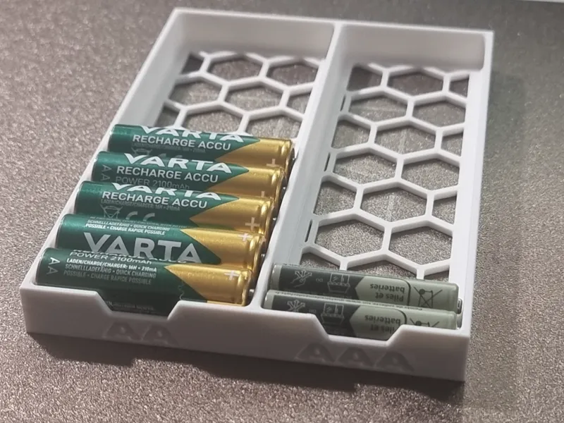 AA and AAA battery holder for shallow drawers