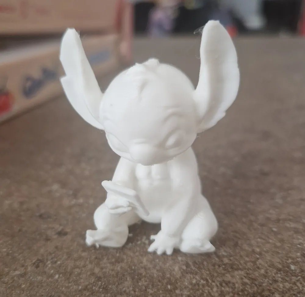 Cute Stitch using the cell phone - Free 3D Print Model - MakerWorld