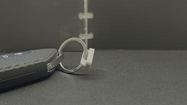Quick release keychain magnet