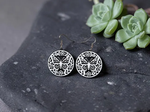 Butterfly medallion earrings