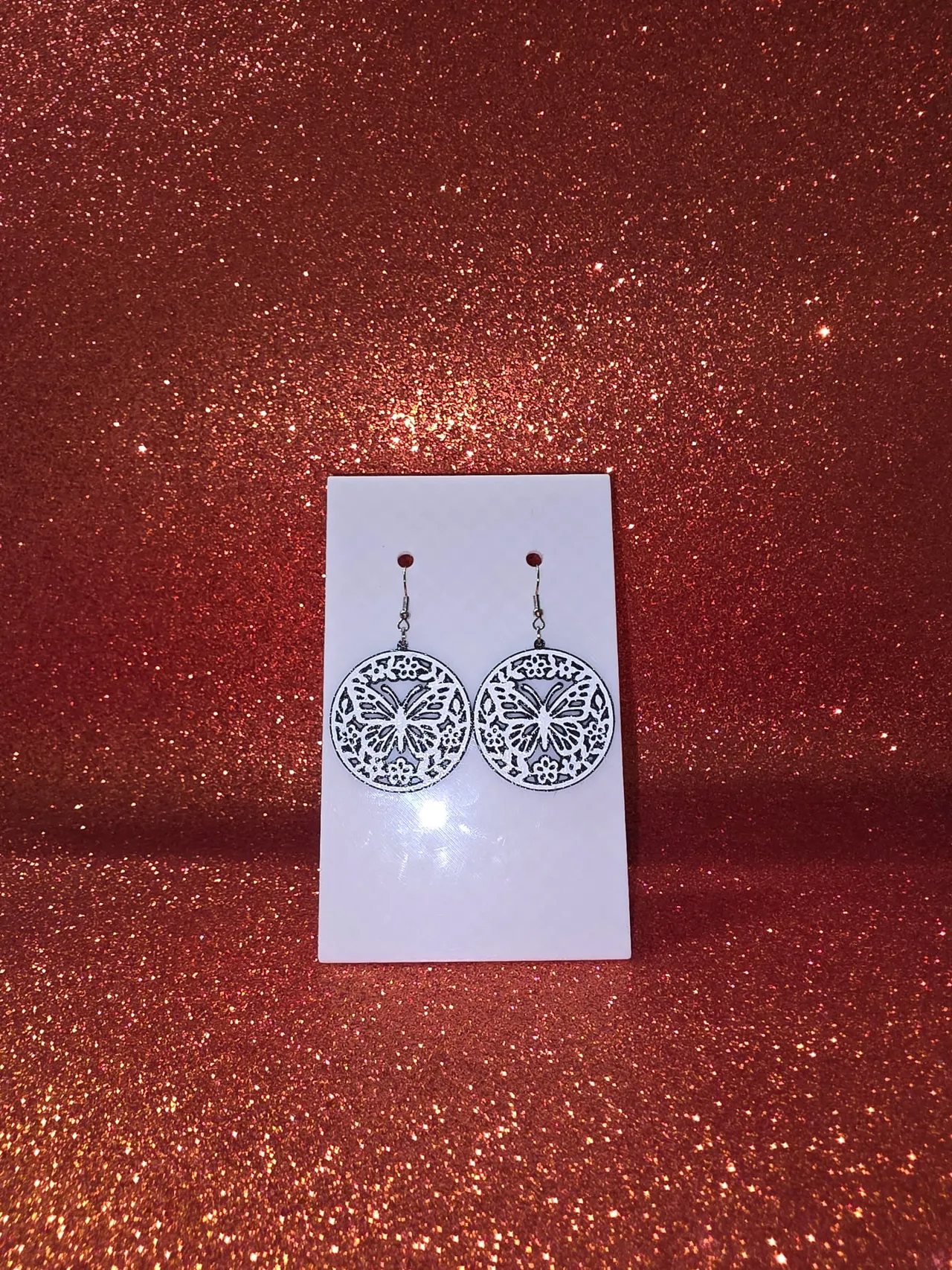 Butterfly medallion earrings view 2