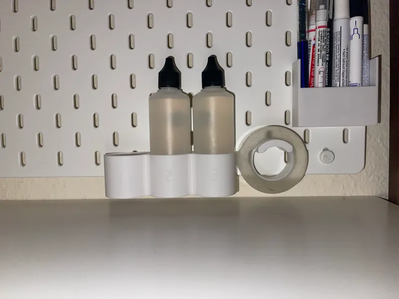 Skadis bottle holder