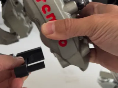 Brake Caliper Holder for Easier FrontWheelRemoval 