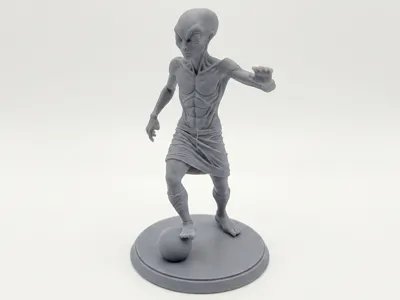 Grey Alien Playing Soccer
