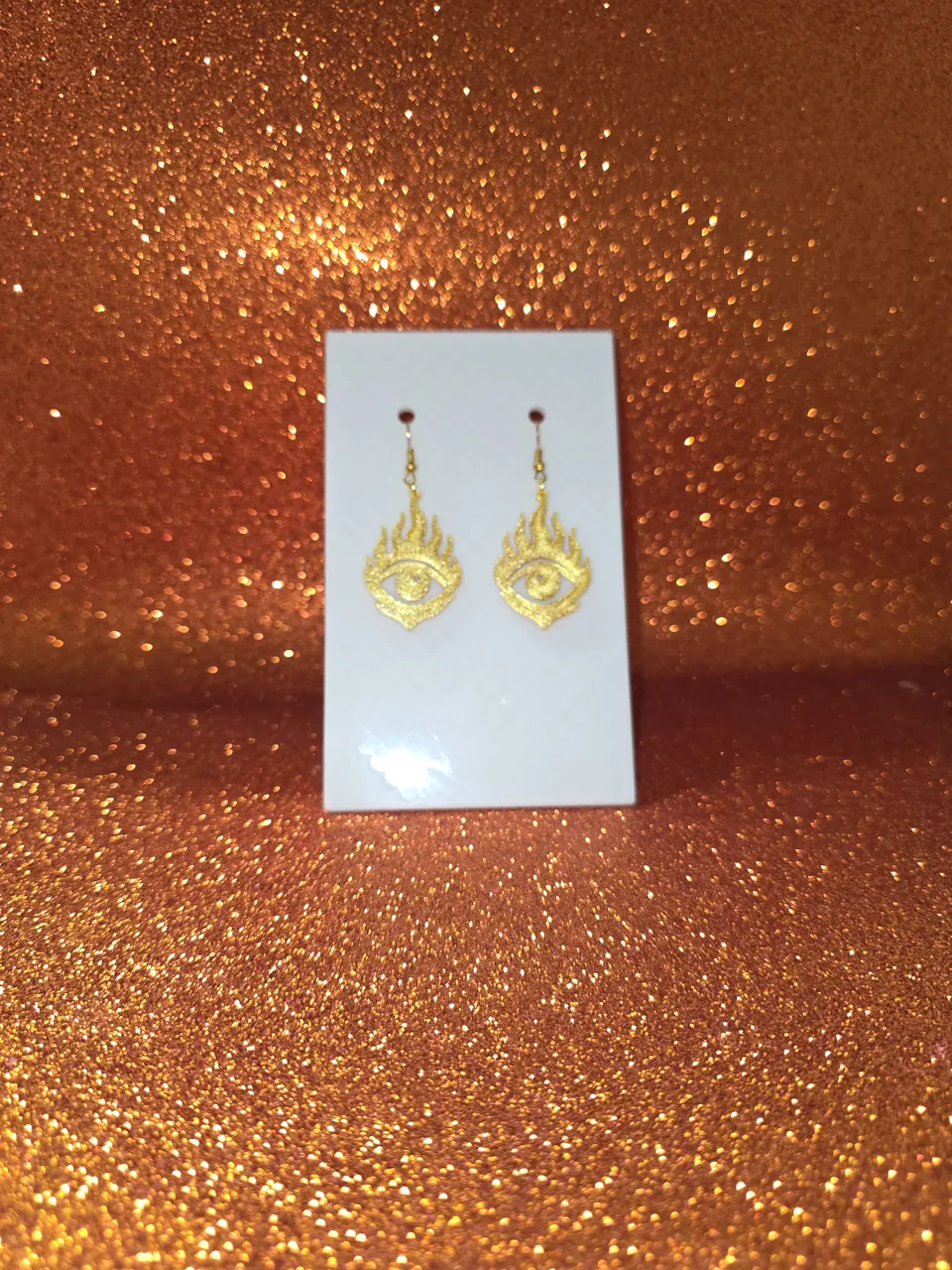 Eye on fire earrings view 2