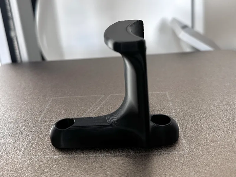 Wall-mounted headphone/headset holder