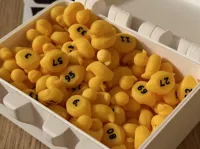 100 numbered ducks