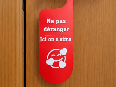 Sign "Do not disturb" door / We love each other