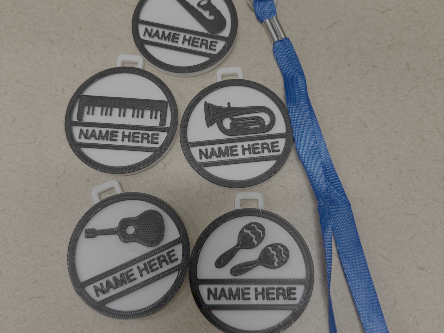 Customizable Instrument medallion keychain or tags