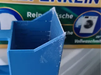 Messbecher für Waschmittel