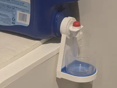 TidySpout: Laundry Cup Holder & Removable Tray