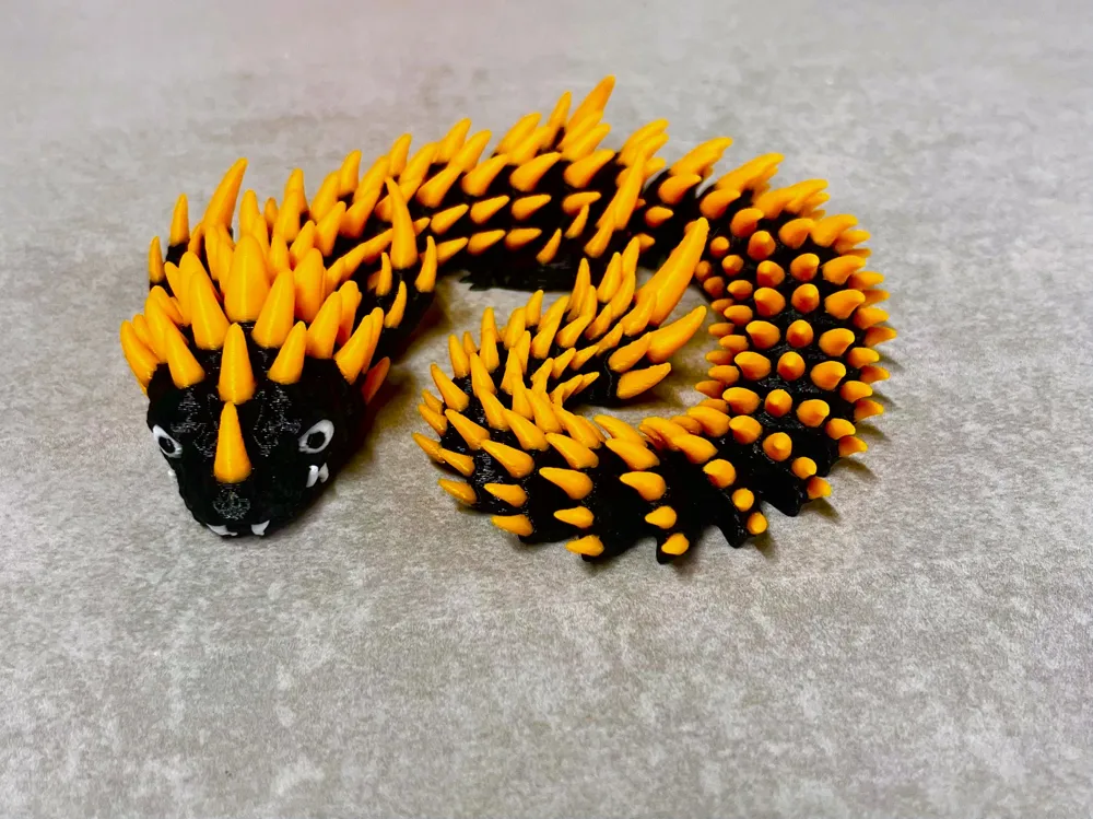 Ember - Articulated Dragon - Free 3D Print Model - MakerWorld