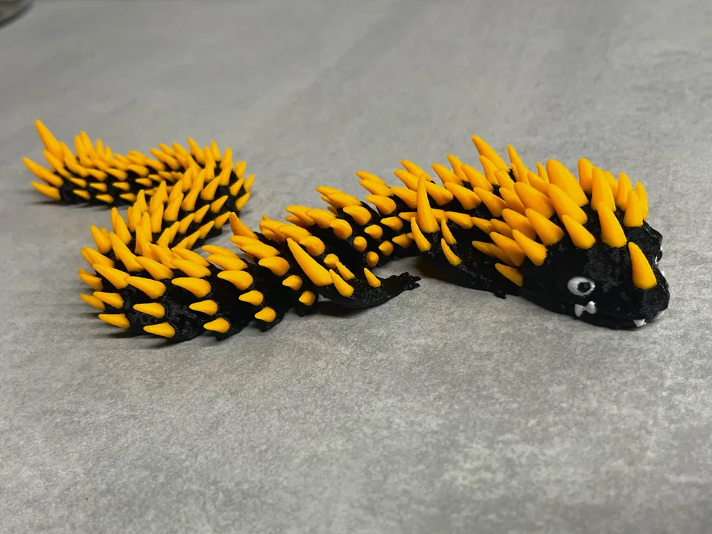 Ember - Articulated Dragon - Free 3D Print Model - MakerWorld