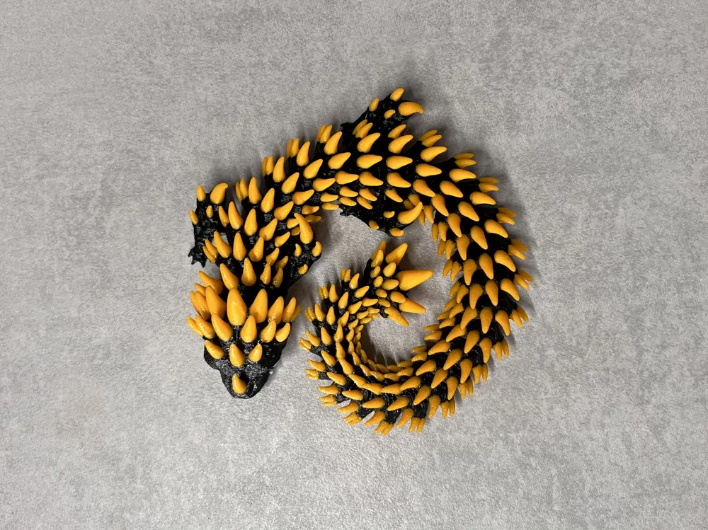 Ember - Articulated Dragon - Free 3D Print Model - MakerWorld