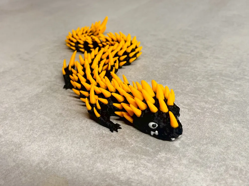 Ember - Articulated Dragon - Free 3D Print Model - MakerWorld