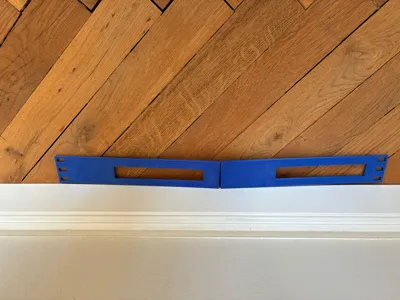 19-inch rack blanking panel with cable pass-through