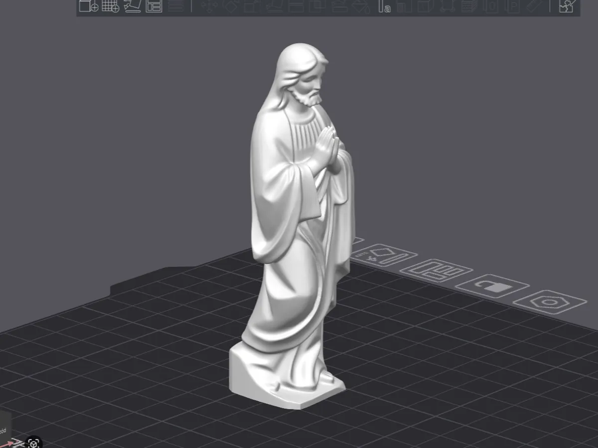 Figurine de Jésus en prière