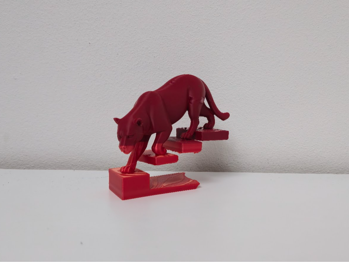 Red Cougar on Floating Stairs Statue