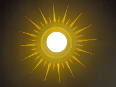 Sun-shaped candle holder