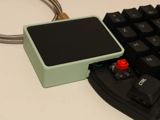 Azoteq TPS65 holder for Lily58