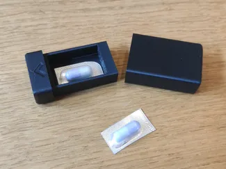 Small Parametric Pill Box with Magnets