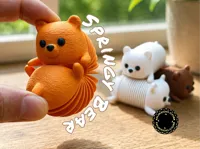 sing and multi color springy bear