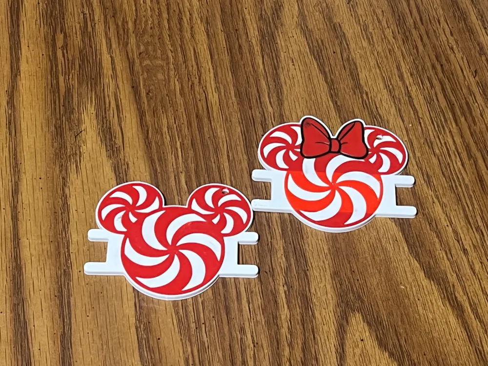 Accesorio para sujetar ligas de cabello: Mickey and Minnie Candy Cane Hair Tie Holders. Referencia del modelo original.