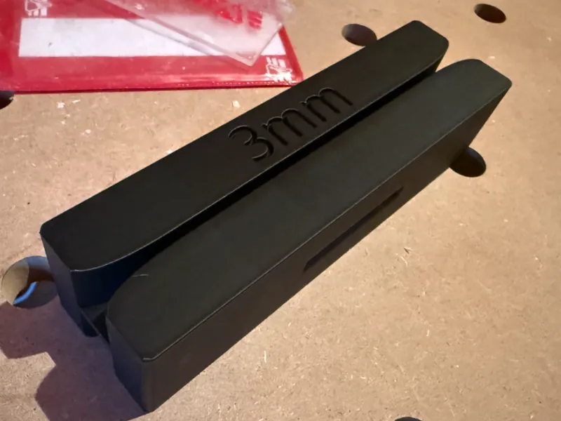 Ski scrapper sharpener