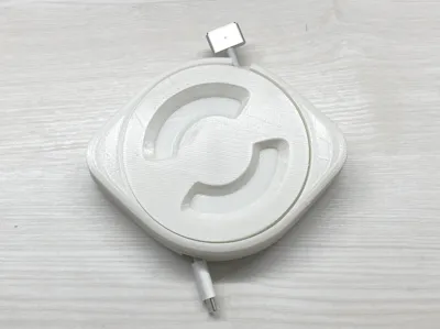 Cable box storage for MacBook MagSafe