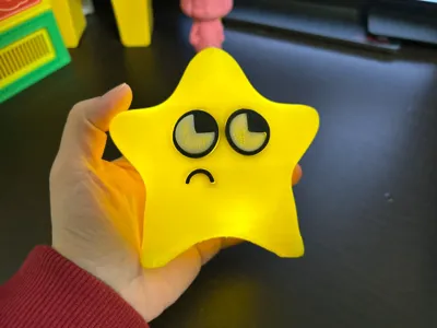 A disdainful, glowing star, a Christmas ornament