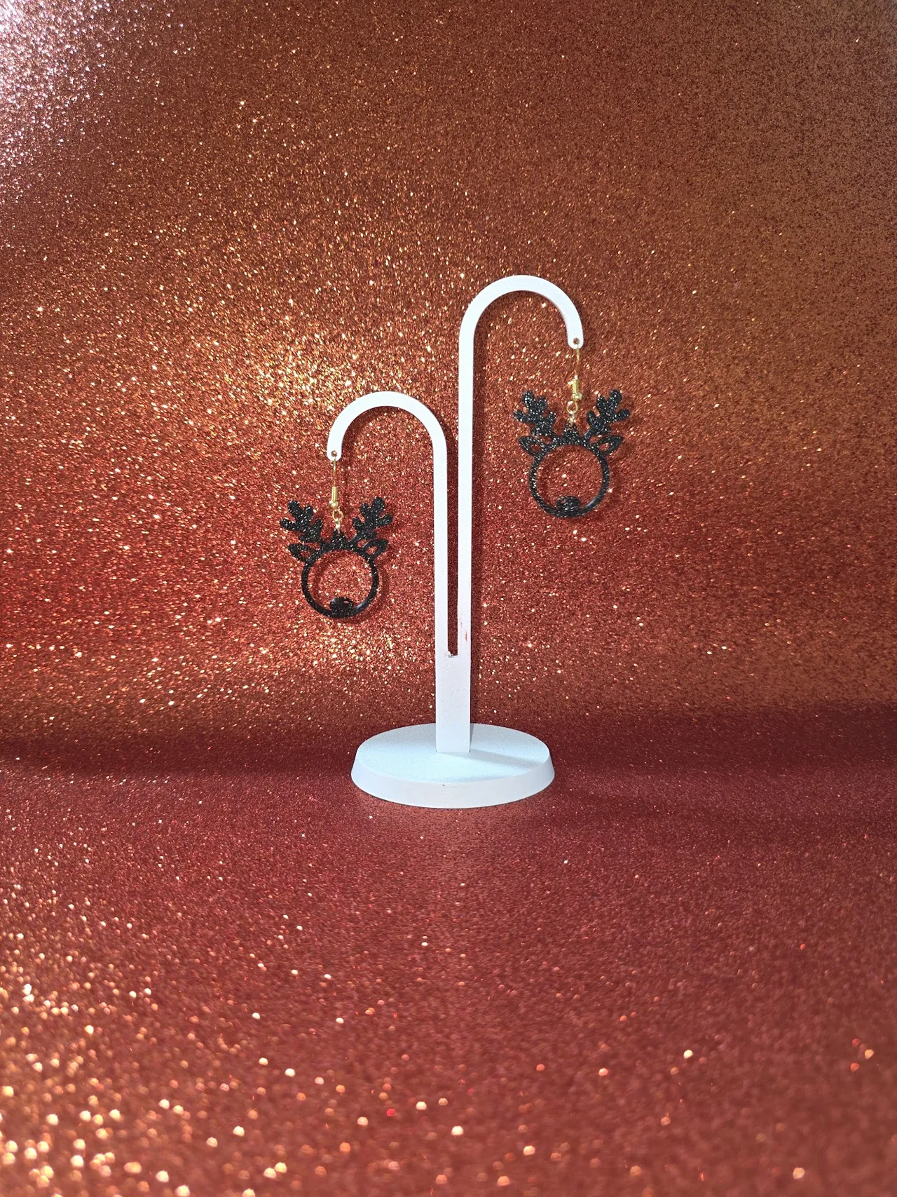 Rounded reindeer earrings view 3