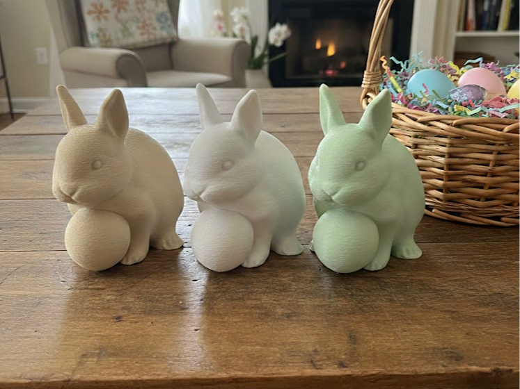 Easter bunny rabbit hiding egg