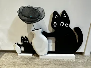 a naughty cat (falling vase)