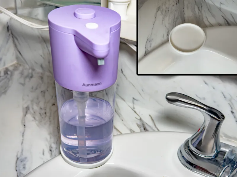 Automatic soap dispenser stand for bathroom sink