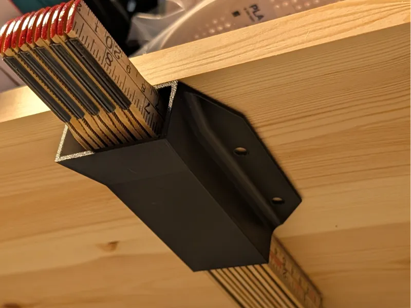 Folding ruler under shelf holder