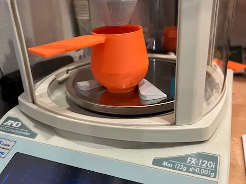 This is a powder cup for the Autotrickler V4.  