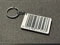 Text "KAUCJA 0,50 ZŁ" with barcode and slot for NFC tag