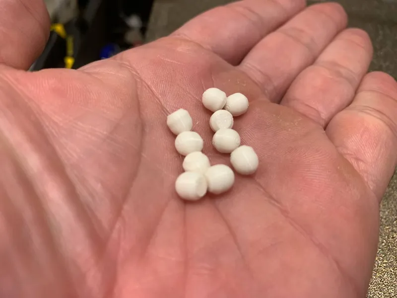 pellets for throwing systems