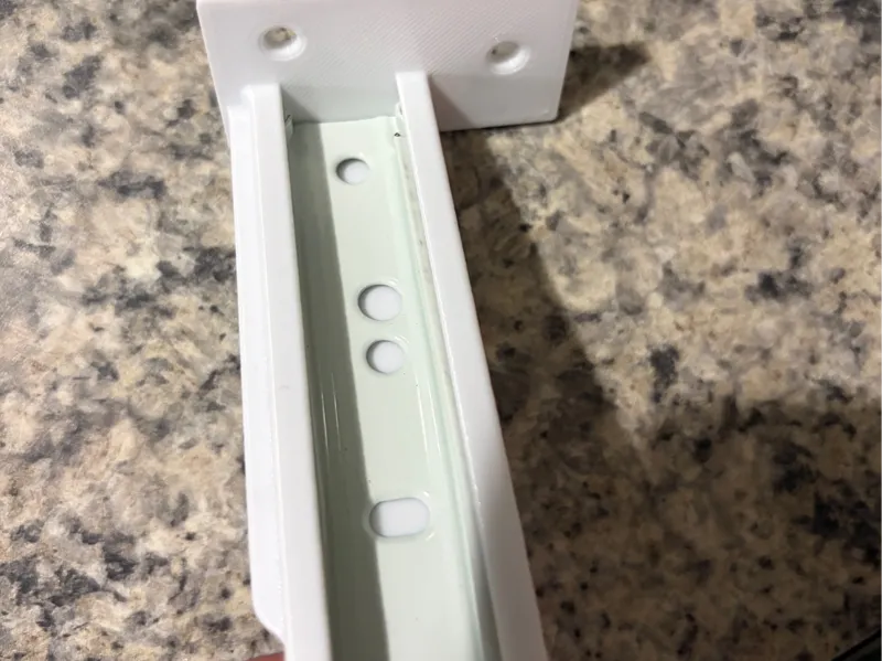Kitchen drawer slide mounting bracket
