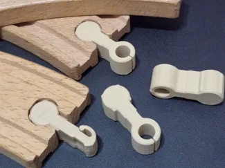 Link for wood train track. Like Brio, IKEA Lillabo