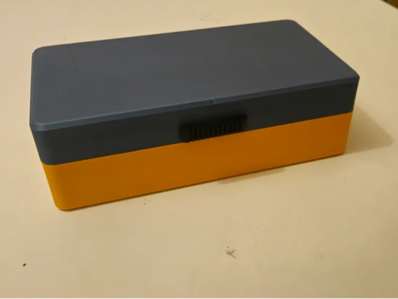 Case with a spring-latch closing mechanism